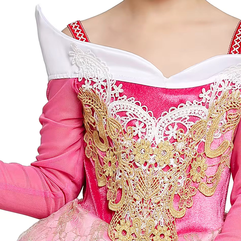 detailed view of embroidered bodice and tulle layers on pink dress