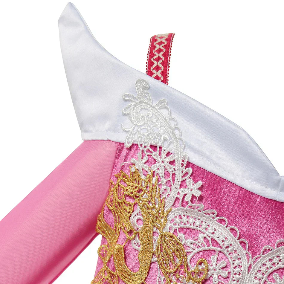 close-up of sheer pink sleeve with delicate princess costume trim