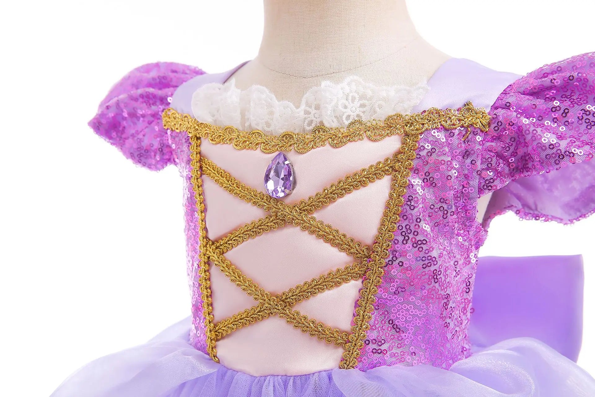 close-up of lavender bodice with ribbon and gold accents