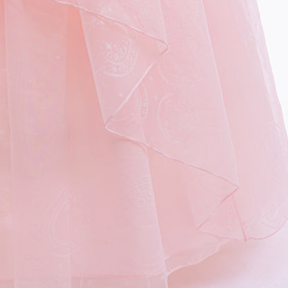 close-up of pink sequin bodice with embroidered accents