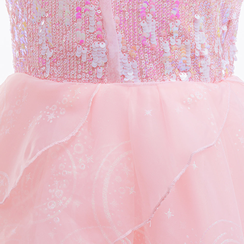 detailed view of lace and sequin embellishments on pink costume dress