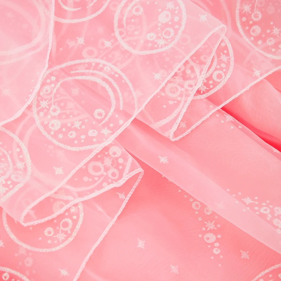 hemline detail of embroidered pink tulle skirt