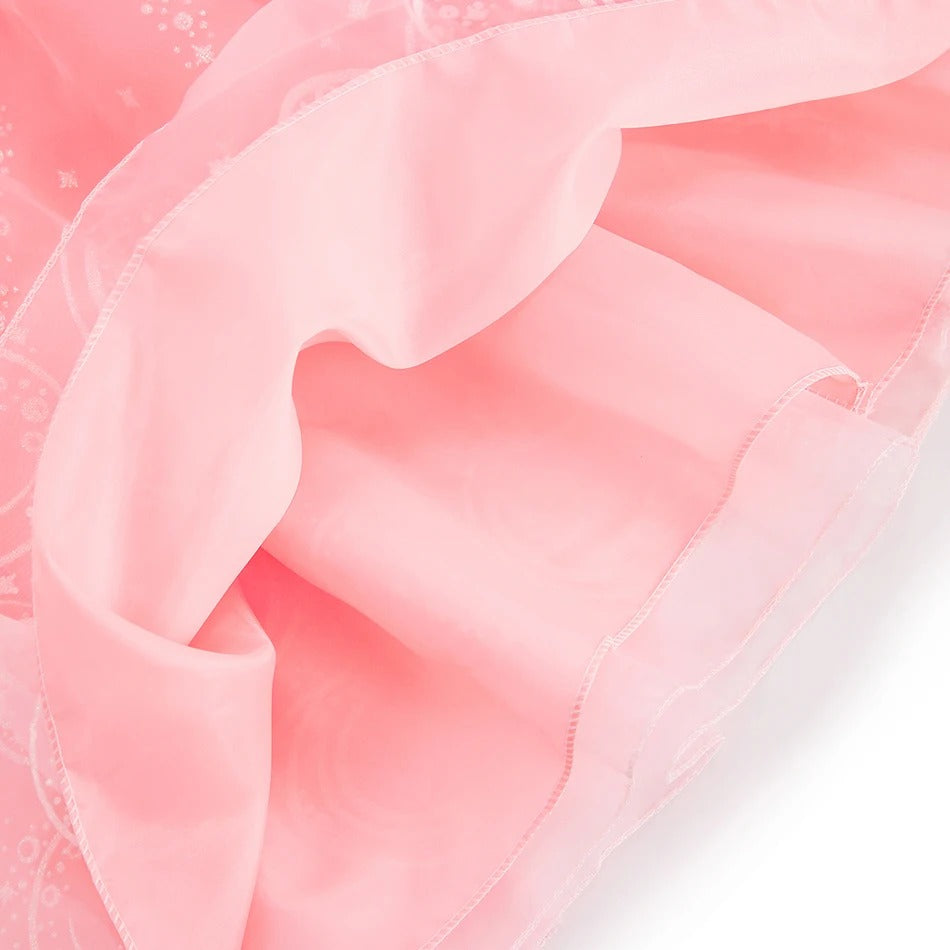 close-up of layered skirt hem on pink princess gown