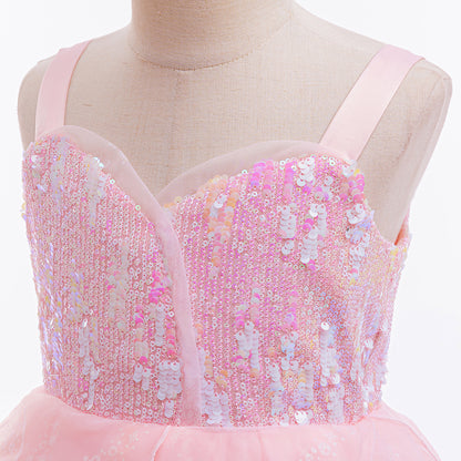close-up of embroidered tulle and sequin texture on pink princess gown