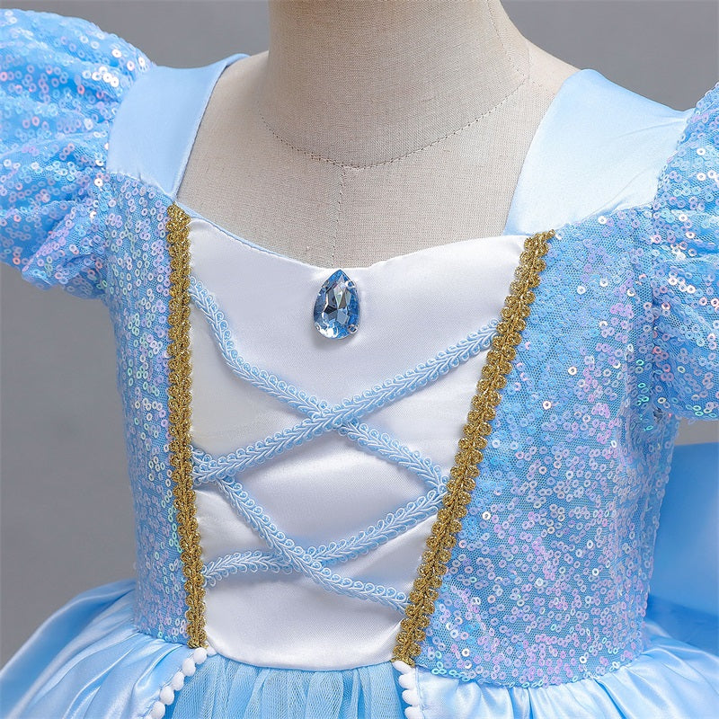 detailed view of shimmering bodice on blue princess costume