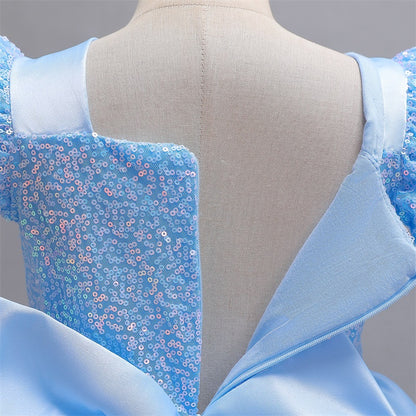 close-up of sequined blue bodice with lace appliqués