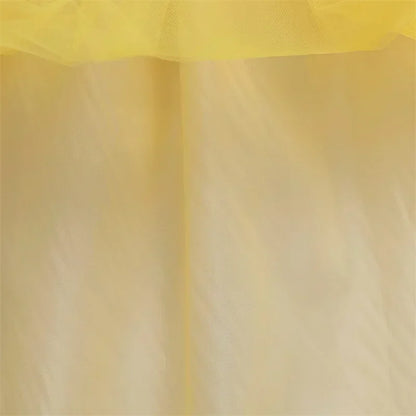 hemline detail of gold layered skirt with tulle effect