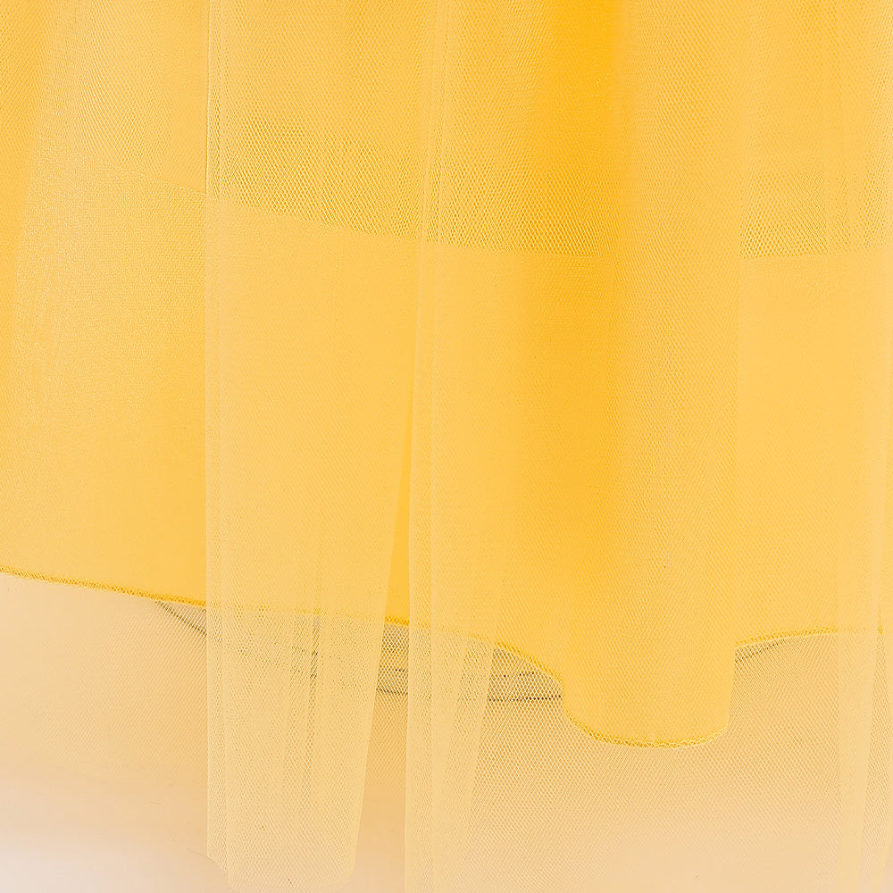 close-up of skirt hem on yellow princess costume