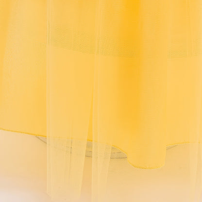 close-up of skirt hem on yellow princess costume